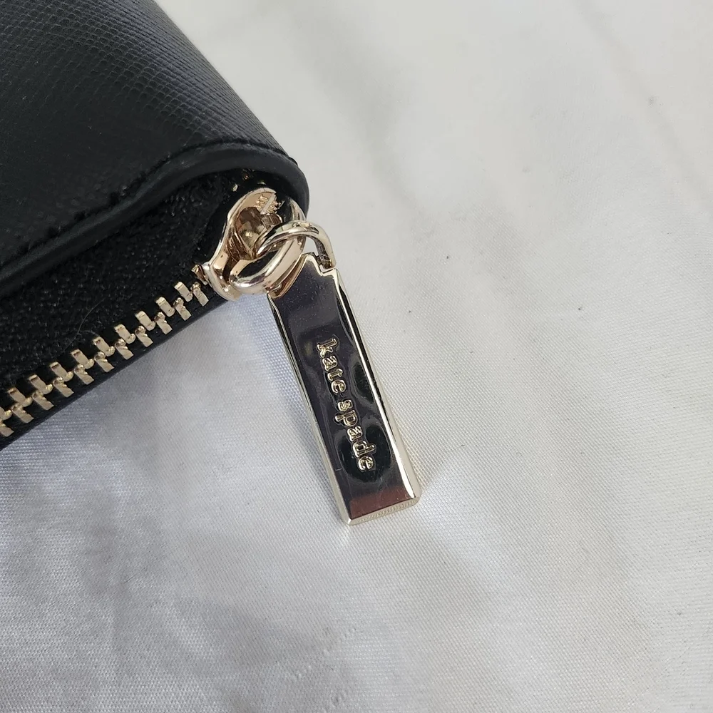 kate spade black zip-around saffiano wallet with gold logo